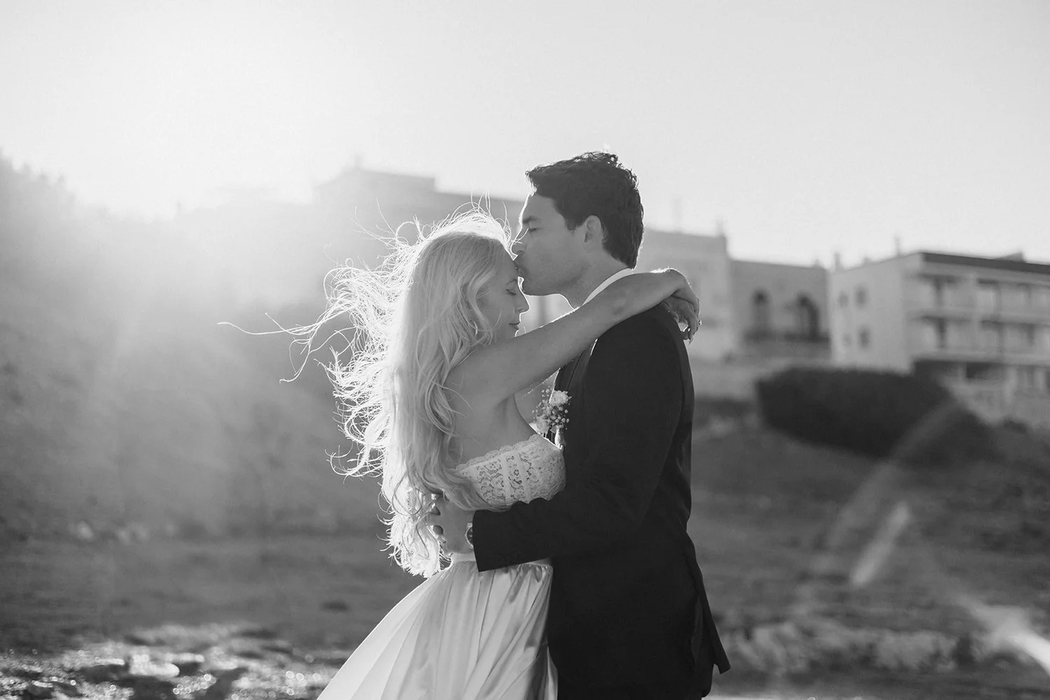 A couple embracing on a beach